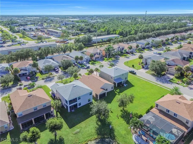 an aerial view of a city with lots of residential buildings