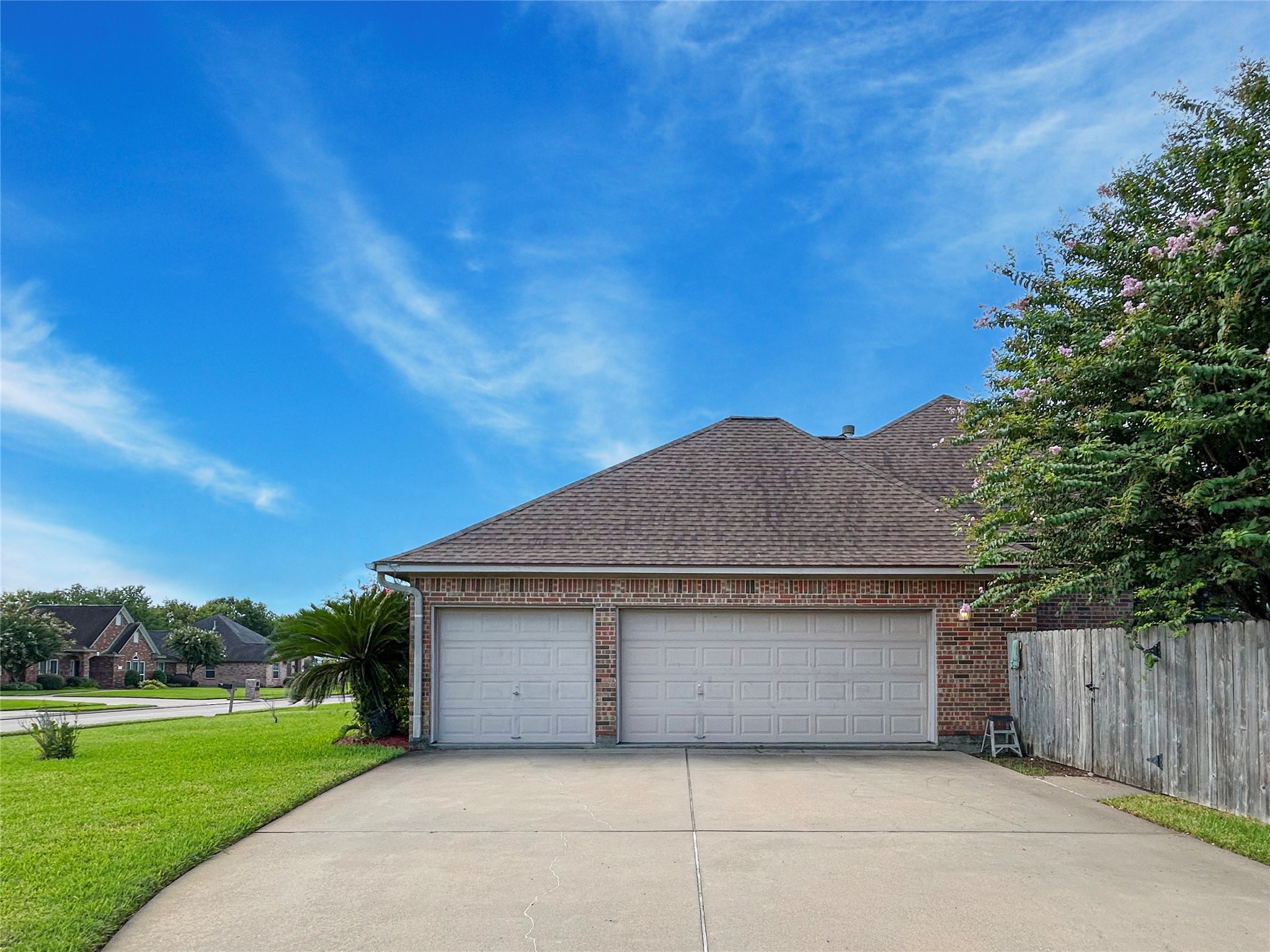 606 Walnut Street Lake Jackson, TX 77566 - Photo 11 of 43 a front view of a house with a yard