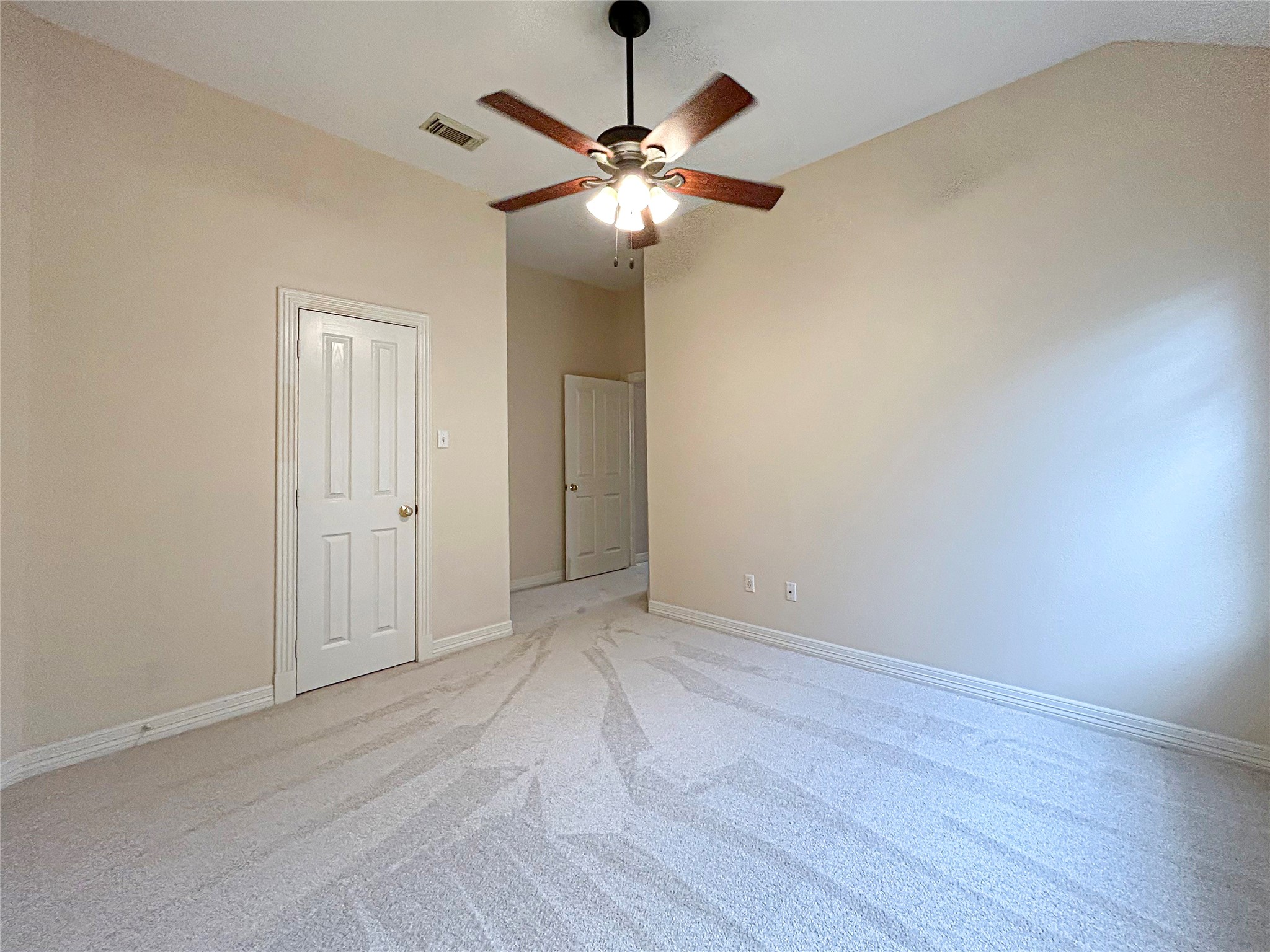 606 Walnut Street Lake Jackson, TX 77566 - Photo 29 of 43 a view of an empty room with wooden floor