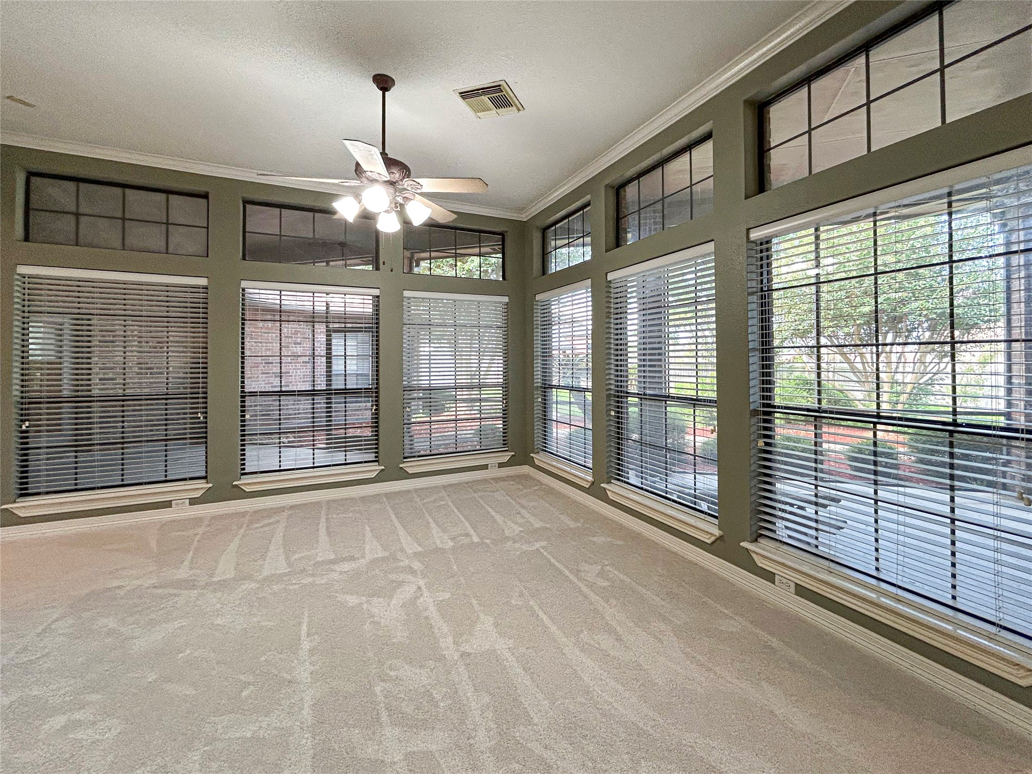 606 Walnut Street Lake Jackson, TX 77566 - Photo 5 of 43 a view of an empty room with a window
