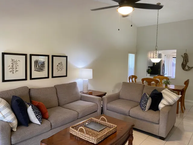 a living room with rug