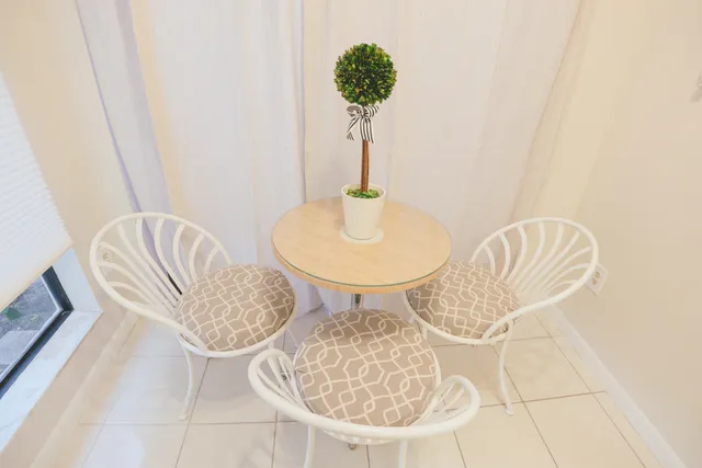 a vase of flowers sitting on a table