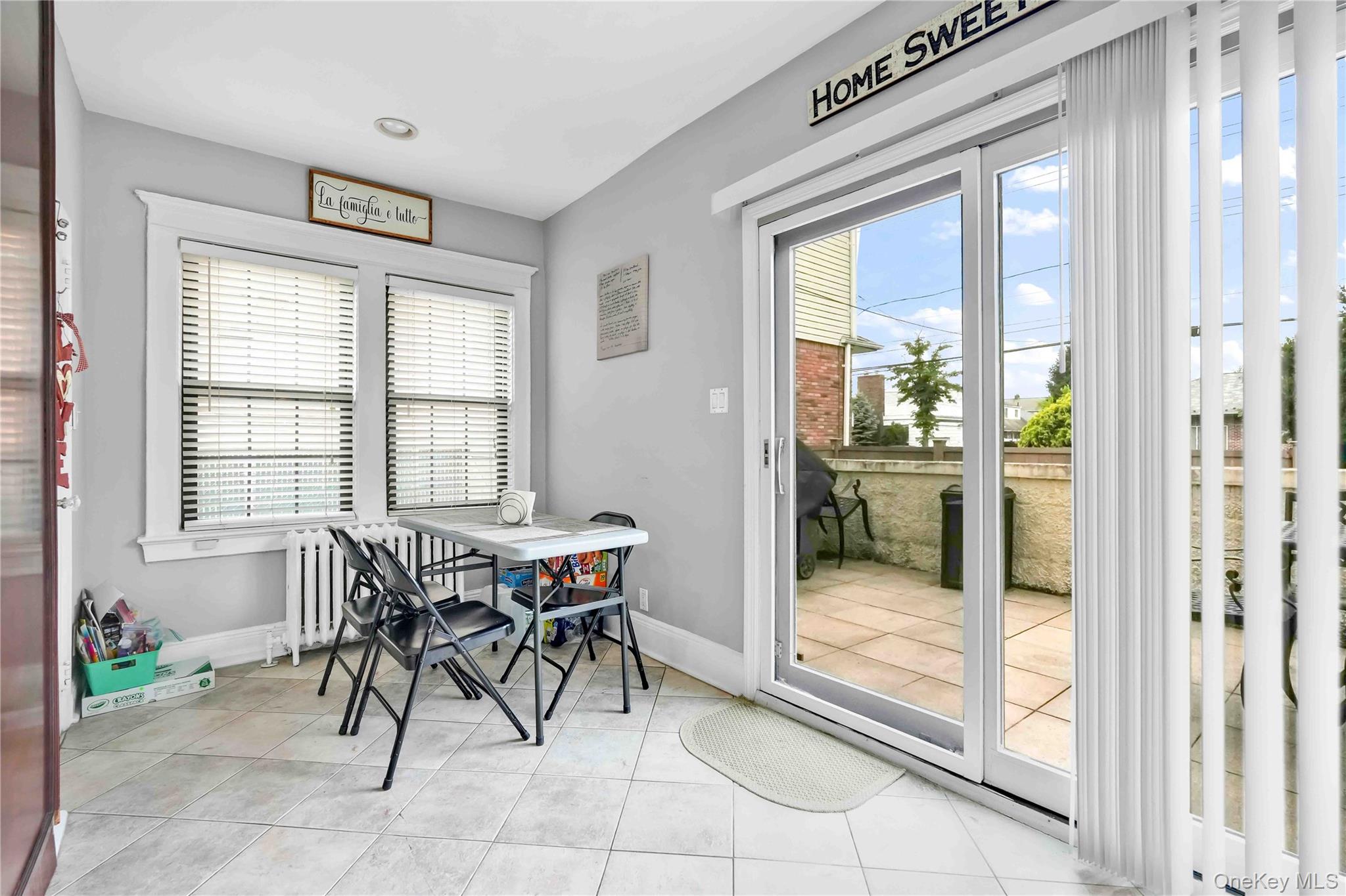 160-08 12th Road Queens, NY 11357 - Photo 6 of 28 a view of a dining room with furniture and a table