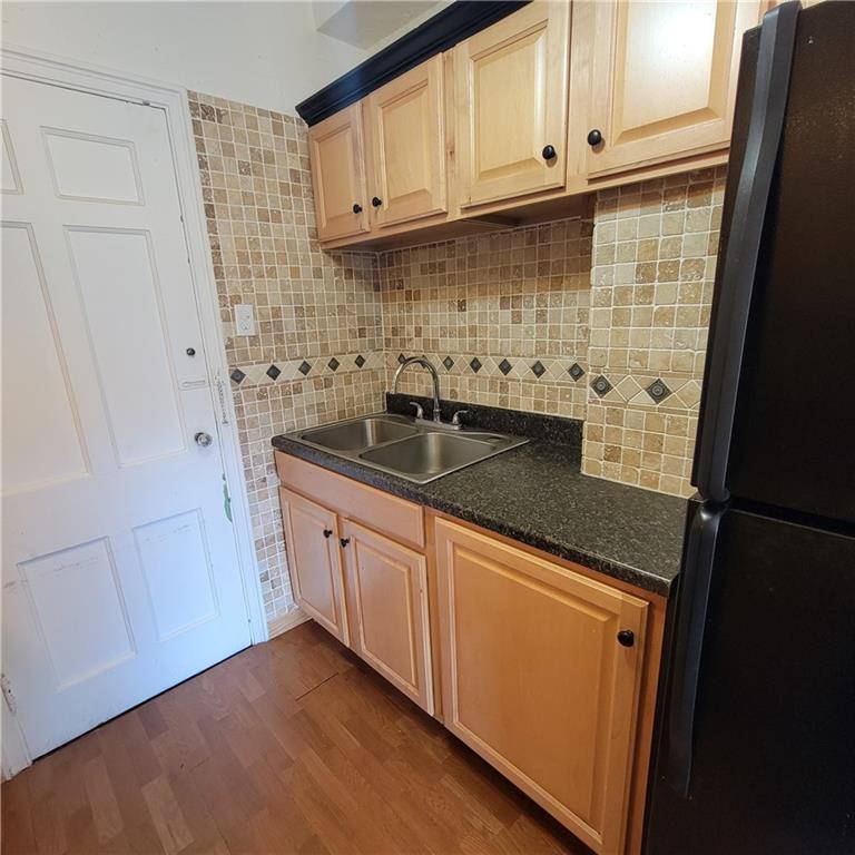144 North Dithridge Street, Unit 306 Pittsburgh, PA 15213 - Photo 12 of 19 a kitchen with stainless steel appliances granite countertop a sink and dishwasher