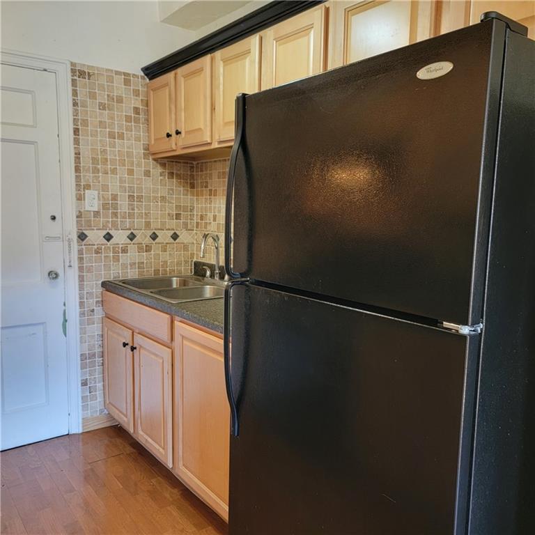 144 North Dithridge Street, Unit 306 Pittsburgh, PA 15213 - Photo 15 of 19 a kitchen with stainless steel appliances and refrigerator