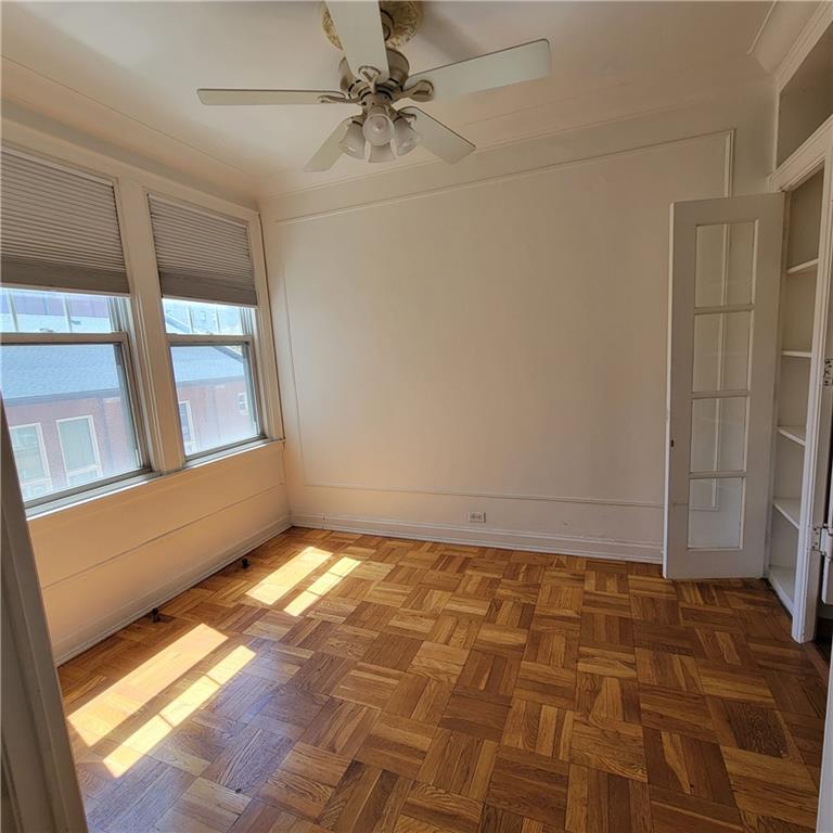 144 North Dithridge Street, Unit 306 Pittsburgh, PA 15213 - Photo 6 of 19 a view of an empty room and window
