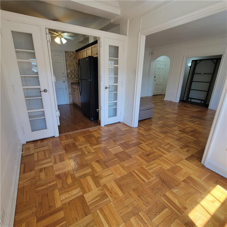 144 North Dithridge Street, Unit 306 Pittsburgh, PA 15213 - Photo 10 of 19 a view of a hallway with wooden floor and staircase