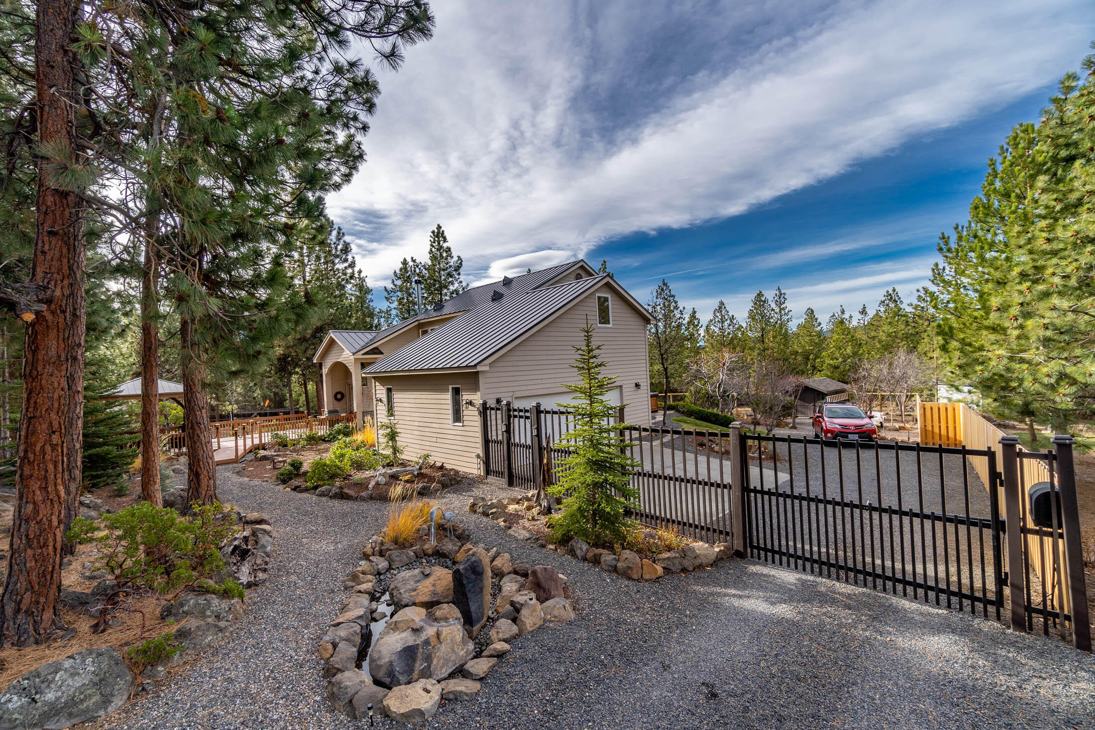 60205 Crater Road Bend, OR 97702 - Photo 5 of 74 Gated and fully fenced yard. Gate is battery operated.