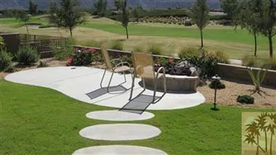 a view of a swimming pool with a patio