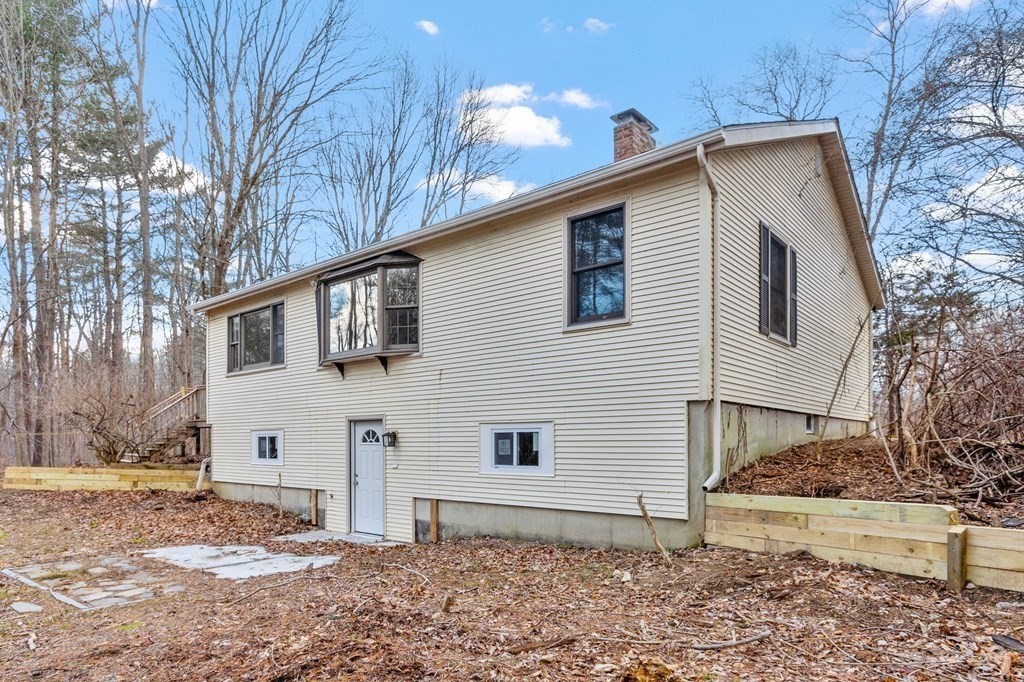 43 Hadley Road Merrimac, MA 01860 - Photo 3 of 19 a view of a house with a yard