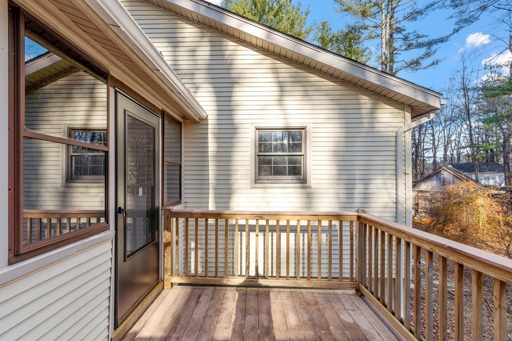 43 Hadley Road Merrimac, MA 01860 - Photo 4 of 19 a view of a wooden house with a large window