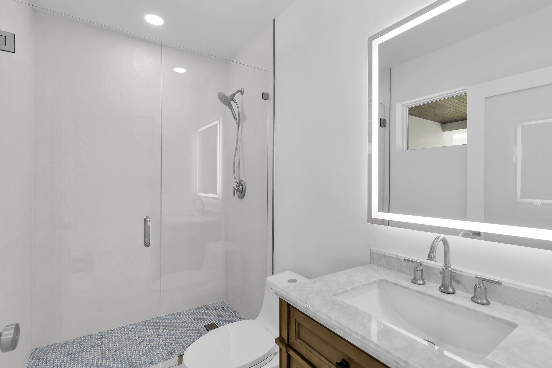 240 14th Street Key Colony Beach, FL 33051 - Photo 50 of 93 a bathroom with a granite countertop sink toilet and shower