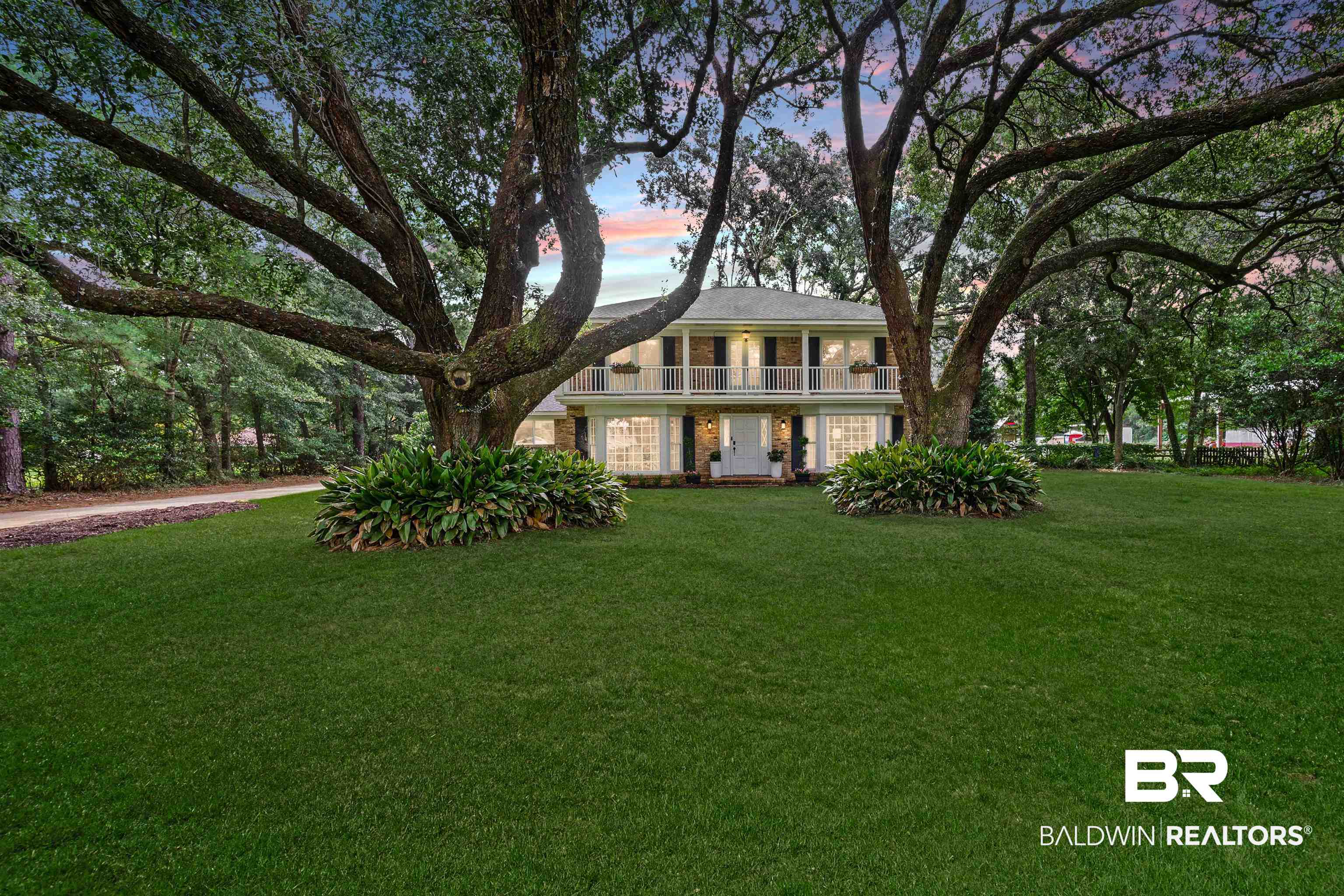 700 Eliza Jordan Road North Mobile, AL 36608 - Photo 1 of 44 View of front of property featuring a lawn and a balcony