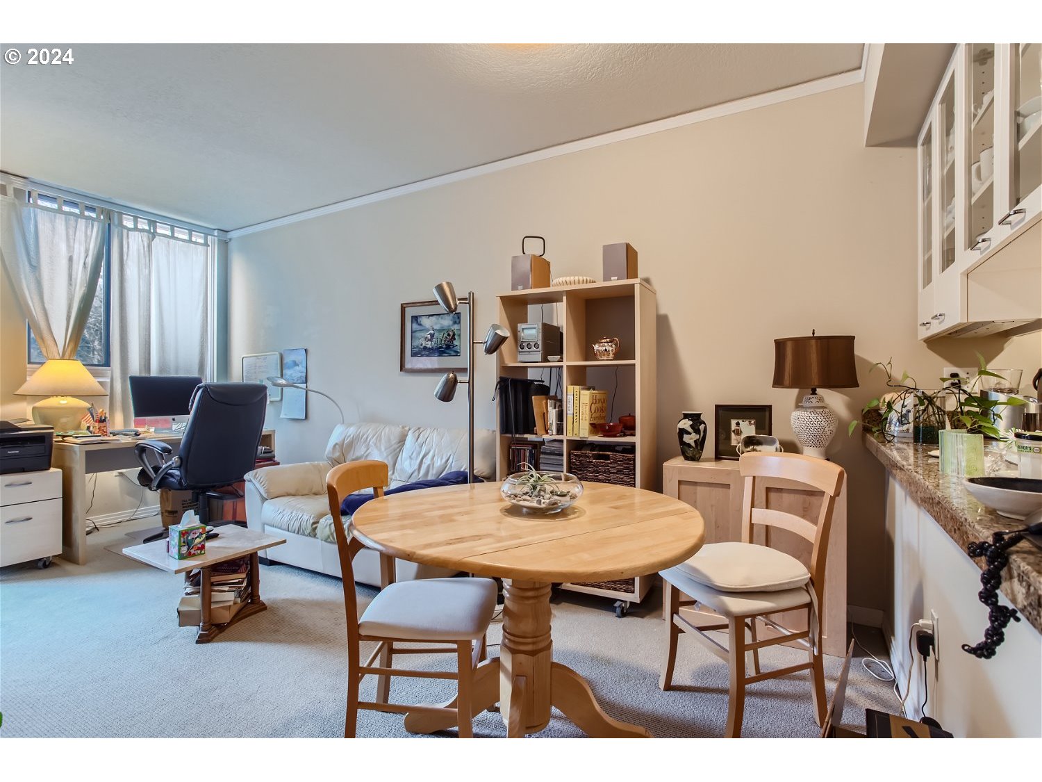 1132 Southwest 19th Avenue, Unit 309 Portland, OR 97205 - Photo 11 of 32 a view of a dining room with furniture