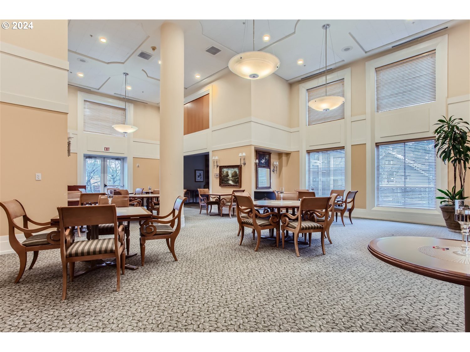 1132 Southwest 19th Avenue, Unit 309 Portland, OR 97205 - Photo 22 of 32 a view of a dining room with furniture