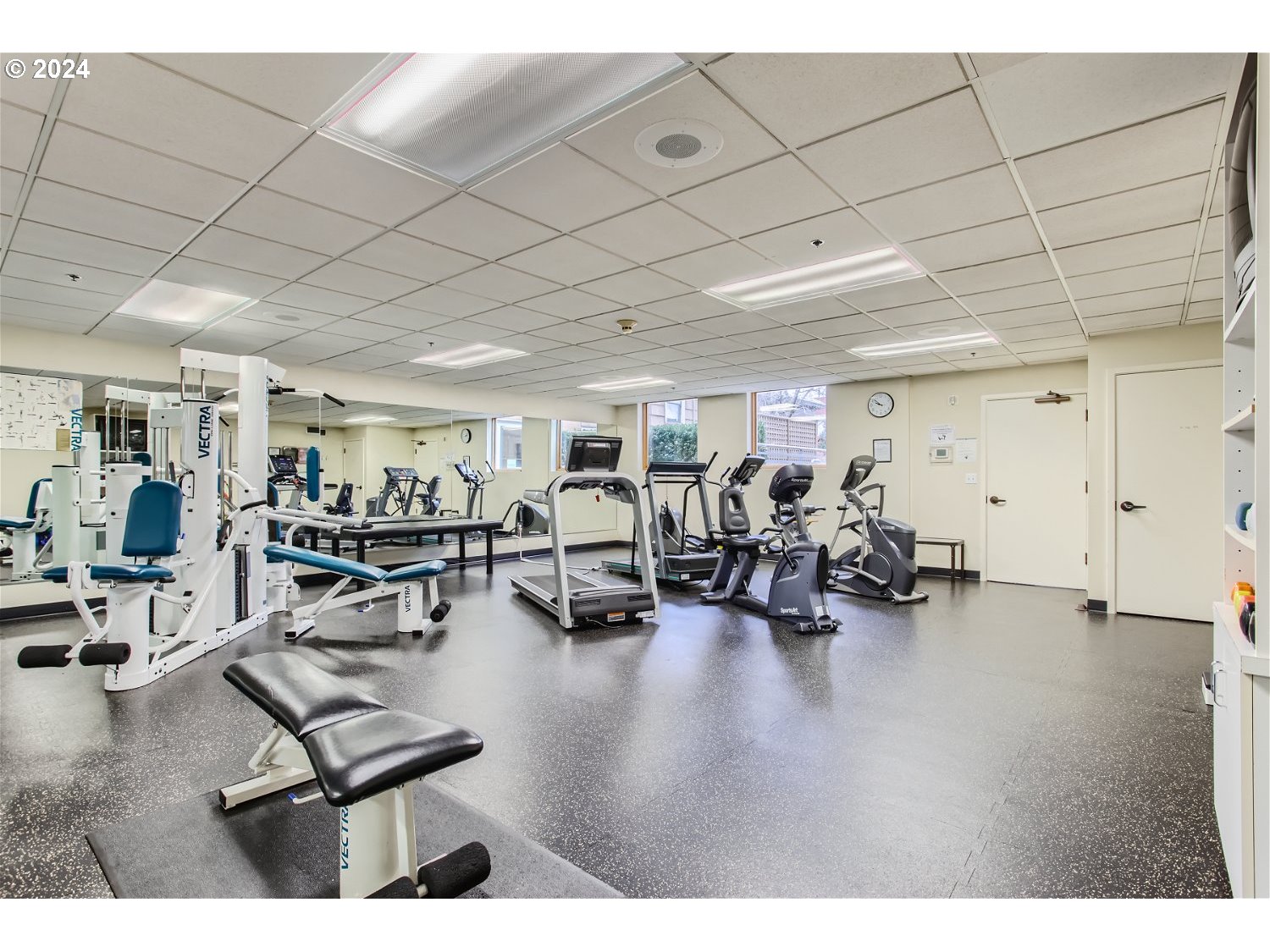 1132 Southwest 19th Avenue, Unit 309 Portland, OR 97205 - Photo 27 of 32 a view of a room with gym equipment