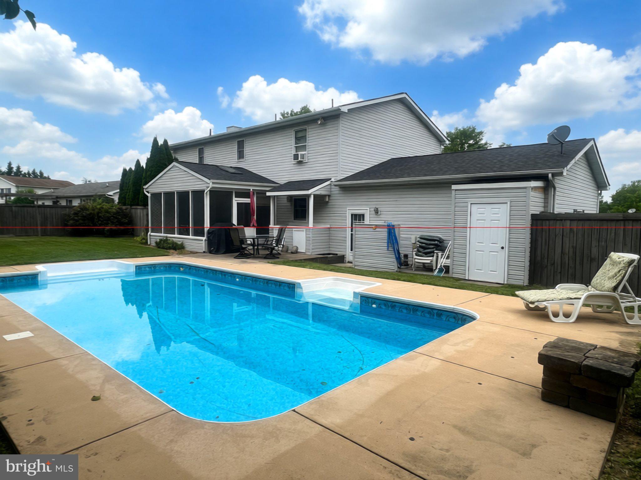 64 Ralphs Court Martinsburg, WV 25404 - Photo 3 of 8 Inviting backyard oasis with pool