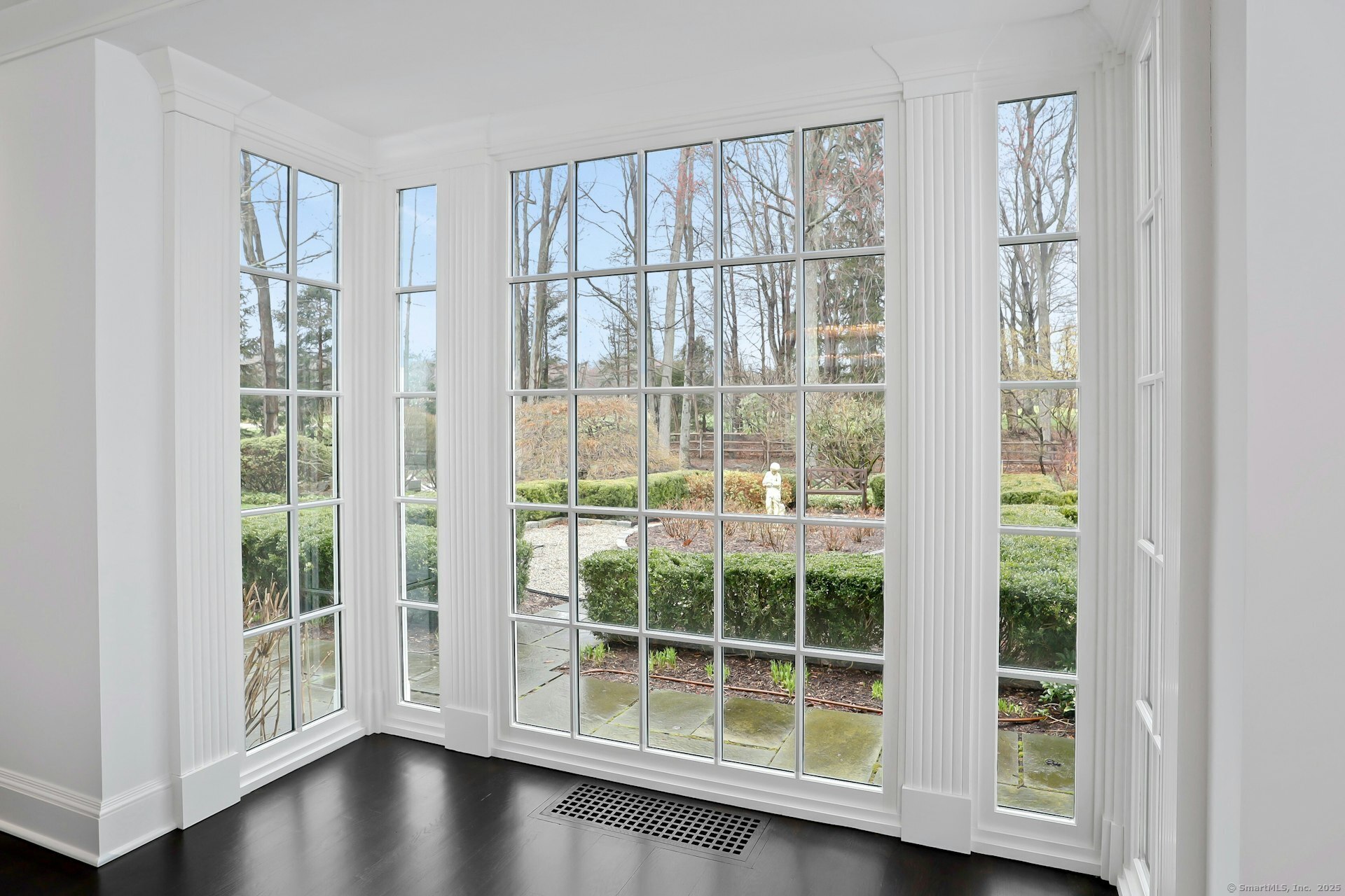 75 Hanson Road Darien, CT 06820 - Photo 9 of 30 a view of wooden floor and windows in a room
