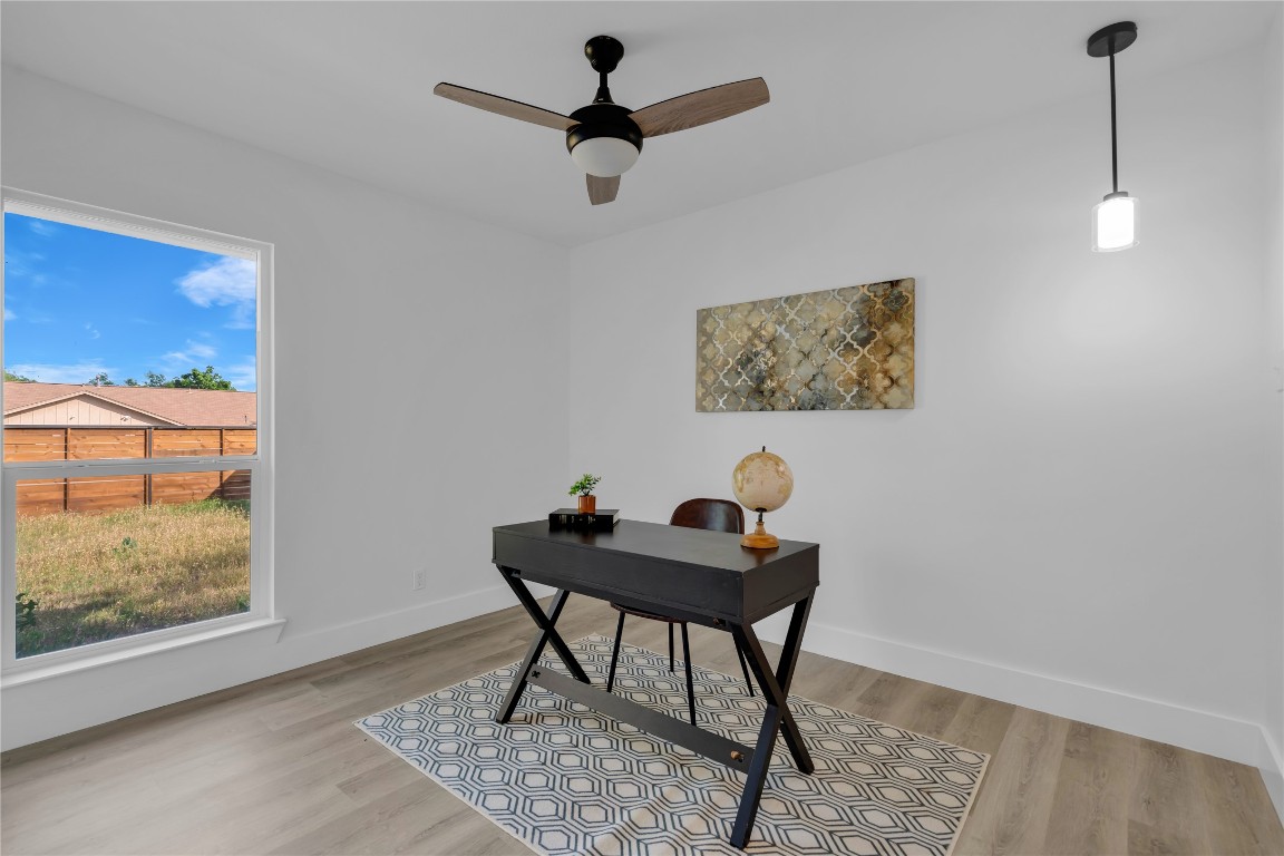 11602 Big Trail Austin, TX 78759 - Photo 11 of 27 a workspace with furniture and window