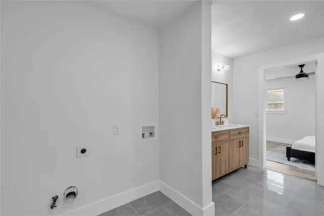 a bathroom with a sink and a toilet