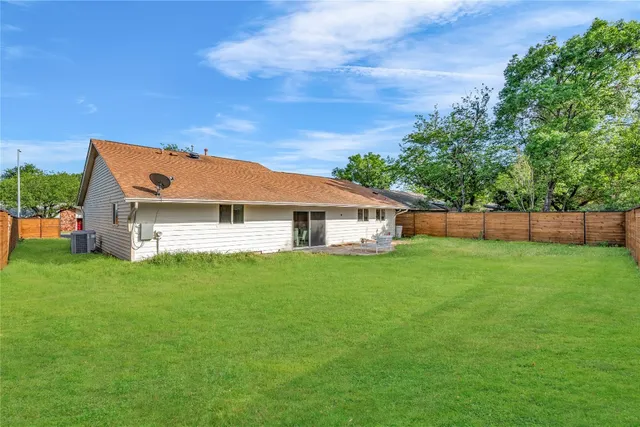a house view with a garden space