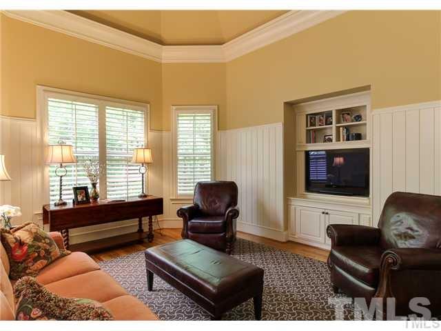 3112 Briar Stream Run Raleigh, NC 27612 - Photo 7 of 25 a living room with furniture and a flat screen tv