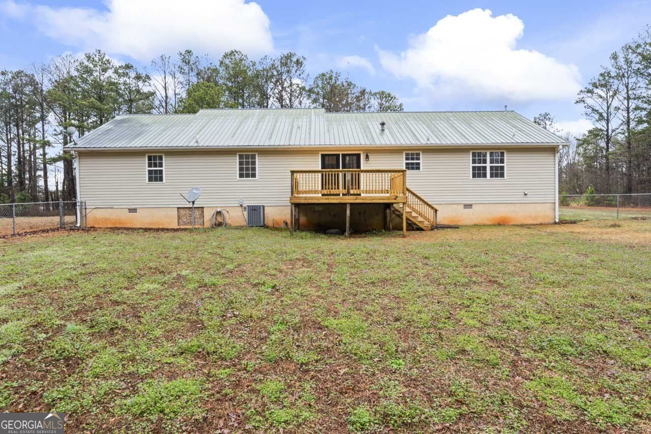 2093 Highway 36 Milner, GA 30257 - Photo 18 of 18 front view of a house with a yard