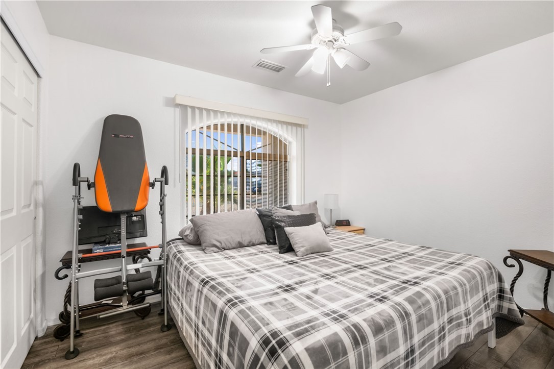 3668 North Neptune Road Golden Valley, AZ 86413 - Photo 28 of 38 This room features light-colored walls, wood-look flooring, and a ceiling fan