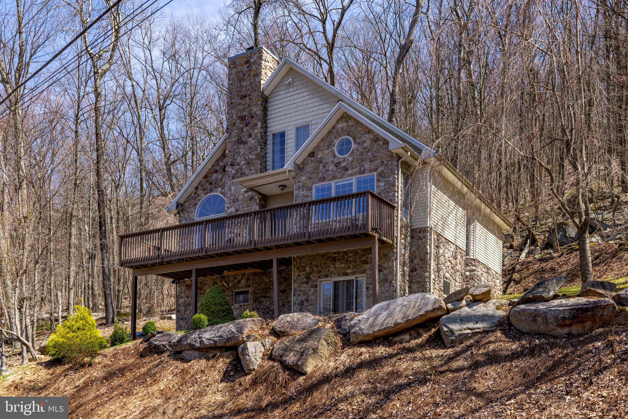 154 Kickapoo Drive Hazleton, PA 18202 - Photo 3 of 86 Charming stone retreat in nature's embrace.