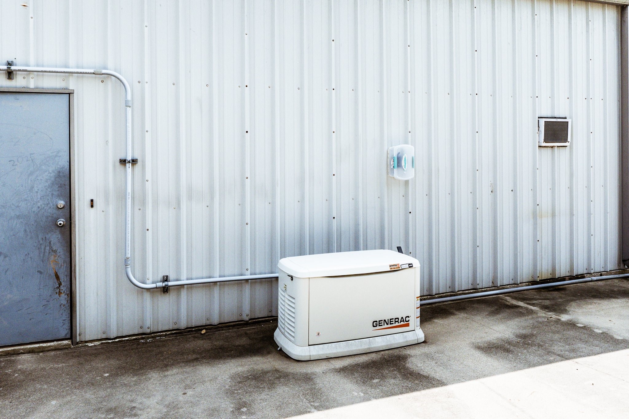 9010 Point Barrow Road Beach City, TX 77523 - Photo 35 of 50 A 26KW Generac generator with automatic transfer switch adds whole-property peace of mind, supported by a dedicated 500-gallon propane tank.