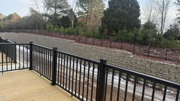 a view of a wooden roof deck