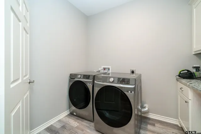 a view of an empty room with windows