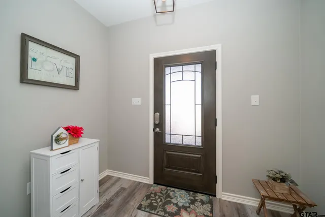 a bedroom with a bed and cabinets