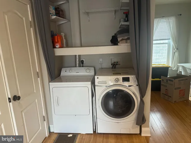 a utility room with dryer and washer