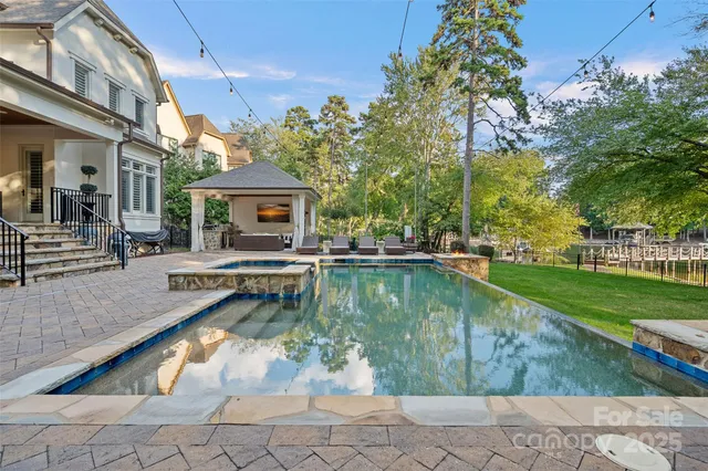 a front view of house with yard green space and porch