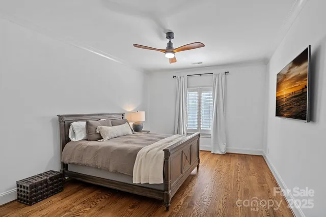 a bathroom with a sink vanity and mirror