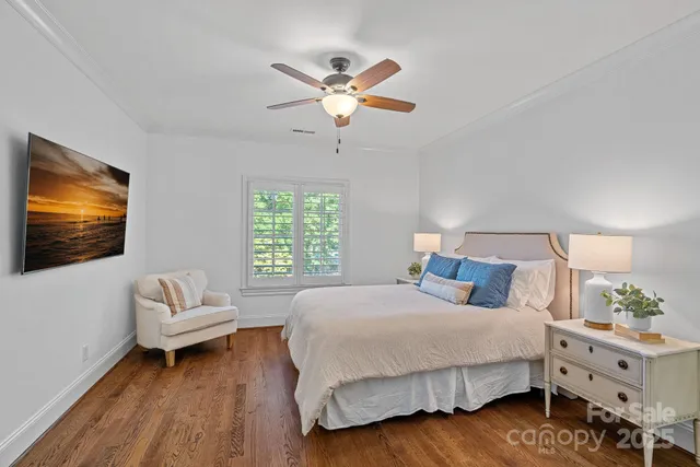 a view of swimming pool with chairs