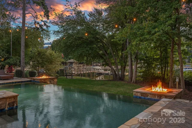 a building outdoor space with patio furniture and garden