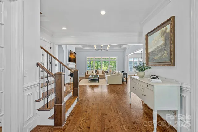 a living room with fireplace furniture and a fireplace