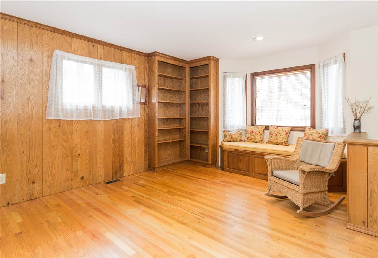 2749 Rue Sans Famille Raleigh, NC 27607 - Photo 17 of 25 Den with Custom Bookshelves
