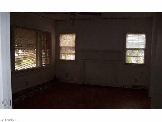 Other. Living Room with Hardwood Floors and Fireplace