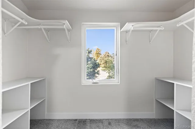 a view of walk in closet with window