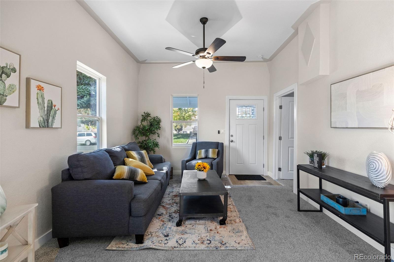 146 Stuart Street Denver, CO 80219 - Photo 14 of 29 a living room with furniture
