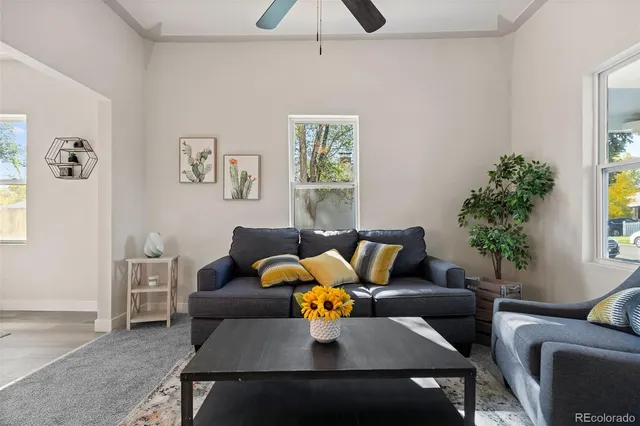 a living room with furniture and window