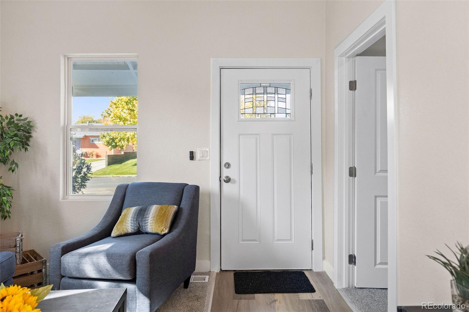 146 Stuart Street Denver, CO 80219 - Photo 19 of 31 a bedroom with a bed and a window