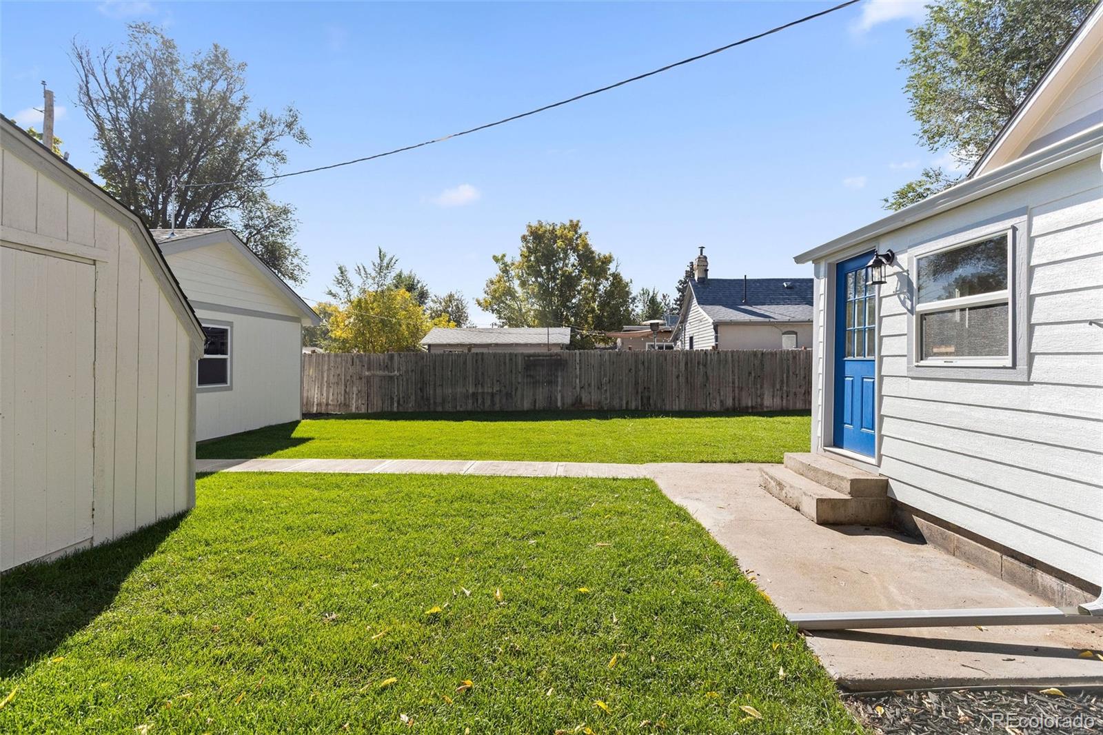 146 Stuart Street Denver, CO 80219 - Photo 29 of 29 a view of a backyard with a garden