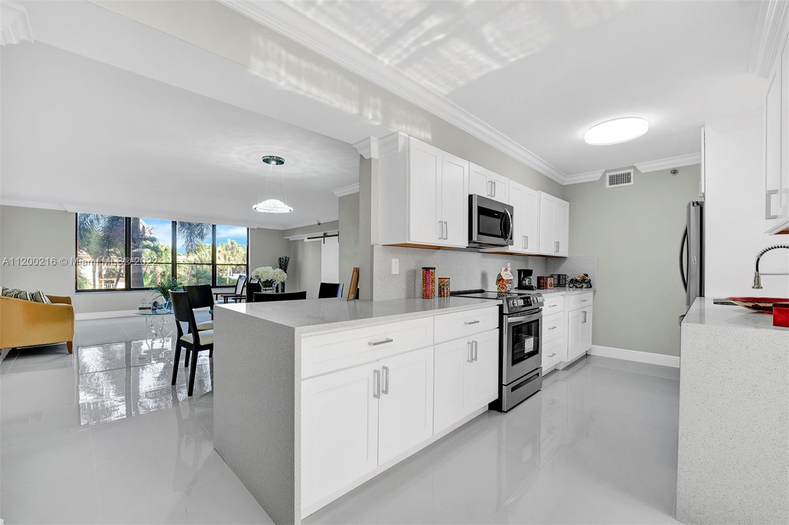 7209 Promenade Drive, Unit 202 Boca Raton, FL 33433 - Photo 1 of 34 Gallery Image 1