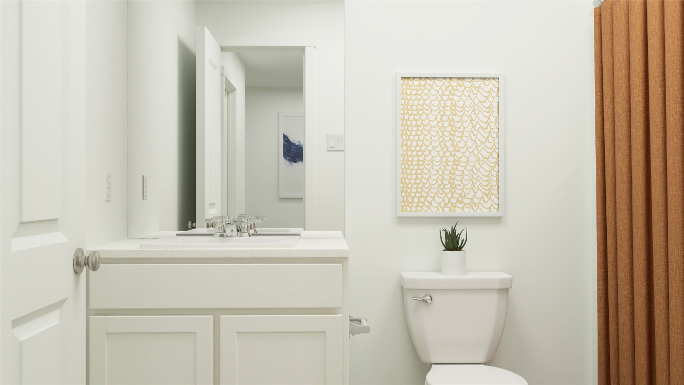 429 Silvercloud Drive Lockhart, TX 78644 - Photo 32 of 37 a bathroom with a sink toilet and mirror
