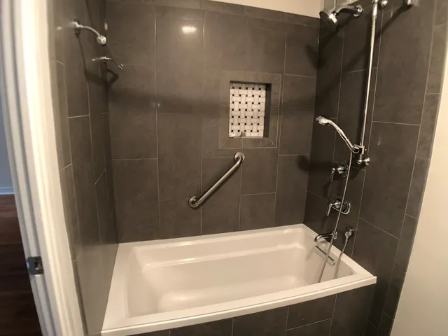 a bathroom with a sink vanity and toilet