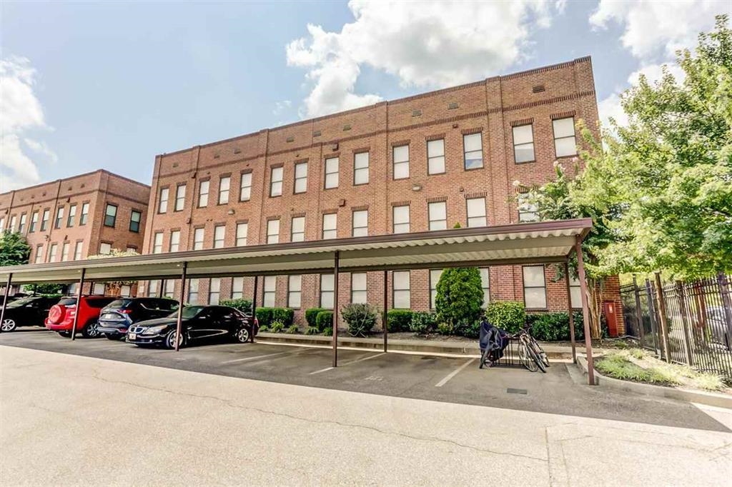 721 Litty Court, Unit 201 Memphis, TN 38103 - Photo 12 of 30 a car parked in front of a building